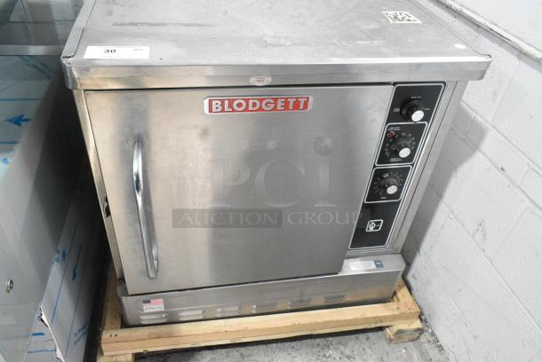 LIKE NEW! 2023 Blodgett DFG-50 Stainless Steel Commercial Natural Gas Powered Half Size Convection Oven w/ Solid Door and Metal Oven Racks. - Image 1 of 6