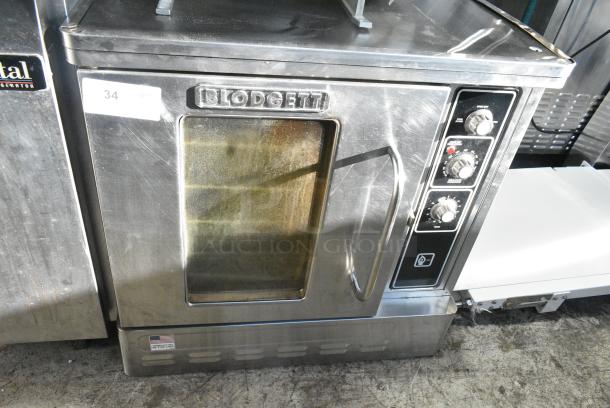 Blodgett DFG-50 Stainless Steel Commercial Countertop Natural Gas Powered Half Size Convection Oven w/ View Through Door, Metal Oven Racks and Thermostatic Controls. - Image 1 of 6