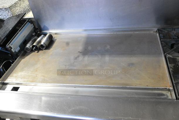 Radiance Stainless Steel Commercial Natural Gas Powered Flat Top Griddle w/ 2 Burners, 2 Ovens, Back Splash and Over Shelf. - Image 3 of 10