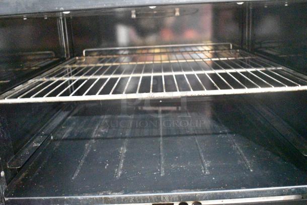 Imperial IR-6-G24 Stainless Steel Commercial Natural Gas Powered 6 Burner Range w/ Flat Top Griddle, 2 Ovens, Over Shelf and Back Splash on Commercial Casters. - Image 8 of 12