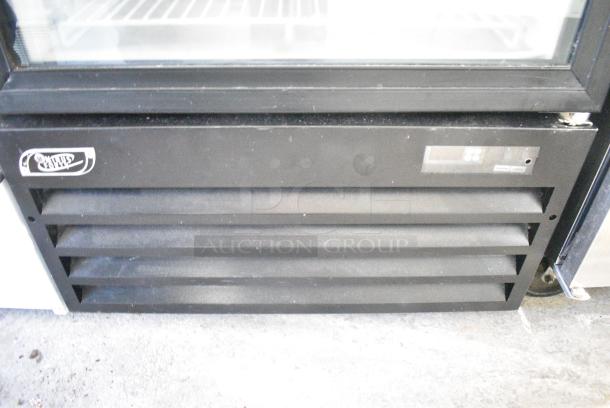 Minus Forty Metal Commercial Single Door Reach In Freezer Merchandiser w/ Poly Coated Racks on Commercial Casters. 115 Volts, 1 Phase. Tested and Powers On But Does Not Get Cold - Image 4 of 13