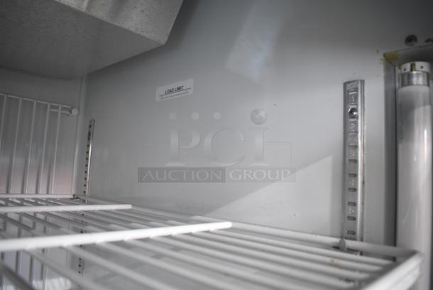 Minus Forty Metal Commercial Single Door Reach In Freezer Merchandiser w/ Poly Coated Racks on Commercial Casters. 115 Volts, 1 Phase. Tested and Powers On But Does Not Get Cold - Image 8 of 13