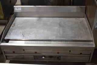 MagiKitch'n Stainless Steel Commercial Countertop Natural Gas Powered Flat Top Griddle.