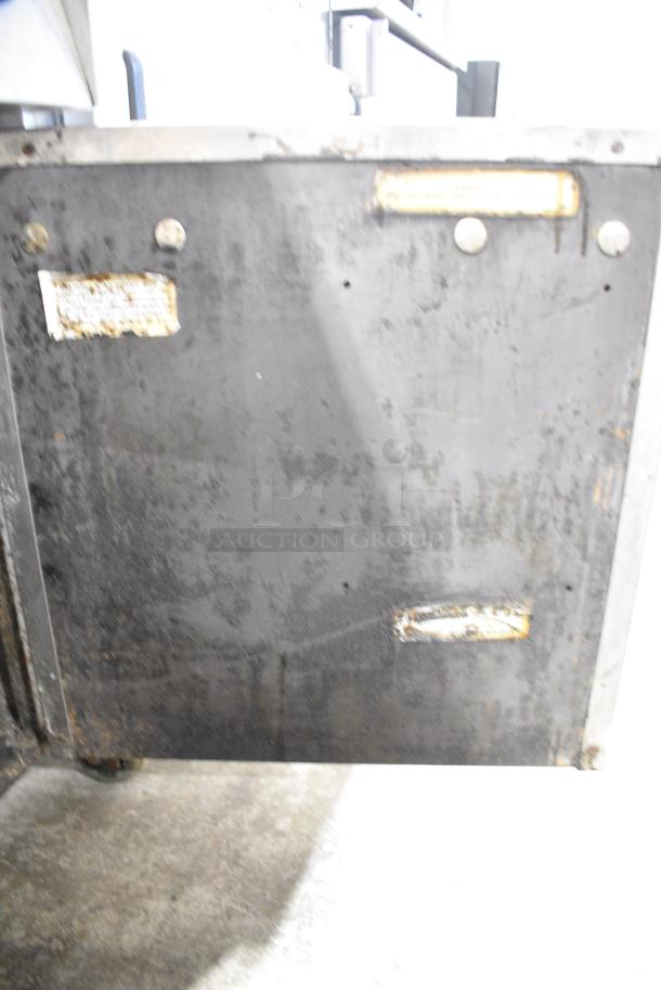 Pitco Frialator Stainless Steel Commercial Floor Style Natural Gas Powered Deep Fat Fryer w/ 2 Metal Fry Baskets on Commercial Casters. - Image 7 of 8