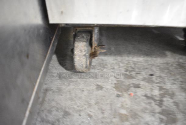 Pitco Frialator Stainless Steel Commercial Floor Style Natural Gas Powered Deep Fat Fryer w/ 2 Metal Fry Baskets on Commercial Casters. - Image 8 of 8