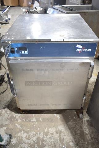 Alto Shaam Stainless Steel Commercial Pass Through Heated Holding Cabinet on Commercial Casters. 115 Volts, 1 Phase. Tested and Does Not Power On