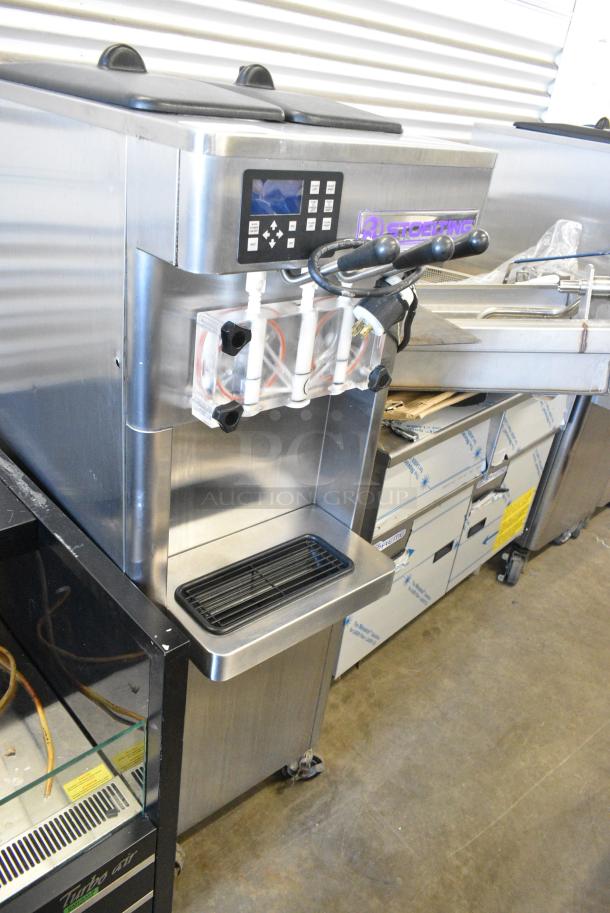 Stoelting F231-109I2 Stainless Steel Commercial Floor Style Water Cooled 2 Flavor w/ Twist Soft Serve Ice Cream Machine on Commercial Casters. 208-230 Volts, 3 Phase. - Image 1 of 11