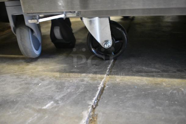 BRAND NEW SCRATCH AND DENT! 2024 Avantco 178SSPT36MHC SS-PT-36M-HC 36" 2 Door Mega Top Stainless Steel Refrigerated Sandwich Prep Table on Commercial Casters. Missing 1 Caster. 115 Volts, 1 Phase. Tested and Working! - Image 4 of 9