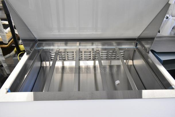 BRAND NEW SCRATCH AND DENT! 2024 Avantco 178SSPT36MHC SS-PT-36M-HC 36" 2 Door Mega Top Stainless Steel Refrigerated Sandwich Prep Table on Commercial Casters. Missing 1 Caster. 115 Volts, 1 Phase. Tested and Working! - Image 5 of 9