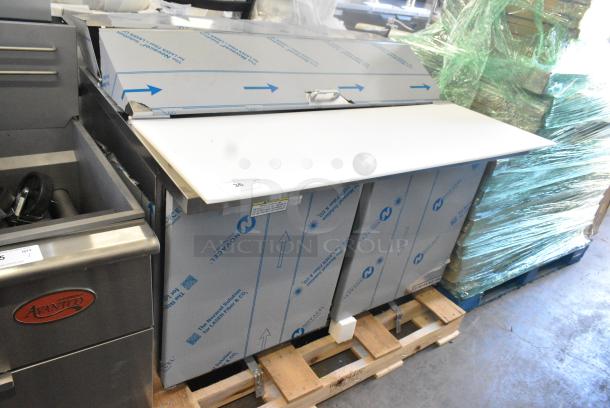 BRAND NEW SCRATCH AND DENT! Beverage Air SPE48HC-12C Elite Series 48" 2 Door Cutting Top Refrigerated Sandwich Prep Table with 17" Deep Cutting Board. 115 Volts, 1 Phase. Tested and Working! - Image 1 of 7