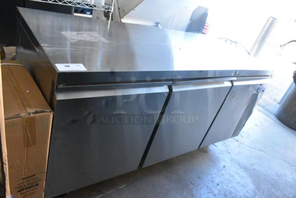 BRAND NEW SCRATCH AND DENT! 2023 Avantco 178SSUC72RHC Stainless Steel Commercial 3 Door Undercounter Cooler on Commercial Casters. 115 Volts, 1 Phase. Tested and Working! - Image 1 of 9