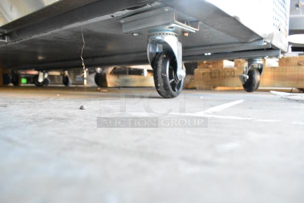 BRAND NEW SCRATCH AND DENT! 2023 Avantco 178SSUC72RHC Stainless Steel Commercial 3 Door Undercounter Cooler on Commercial Casters. 115 Volts, 1 Phase. Tested and Working! - Image 4 of 9