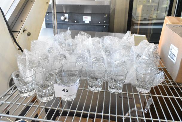 33 Shot Glasses. 33 Times Your Bid! - Image 1 of 4