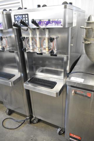 Stoelting F231-109I2 Stainless Steel Commercial Floor Style Water Cooled 2 Flavor w/ Twist Soft Serve Ice Cream Machine on Commercial Casters. 208-230 Volts, 3 Phase.