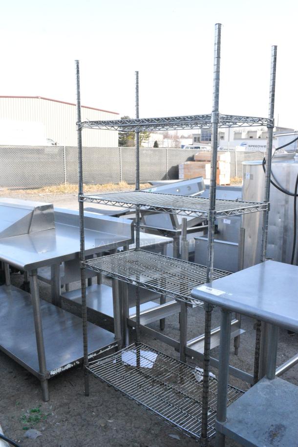 Chrome Finish 4 Tier Wire Shelving Unit. BUYER MUST DISMANTLE. PCI CANNOT DISMANTLE FOR SHIPPING. PLEASE CONSIDER FREIGHT CHARGES. - Image 1 of 4