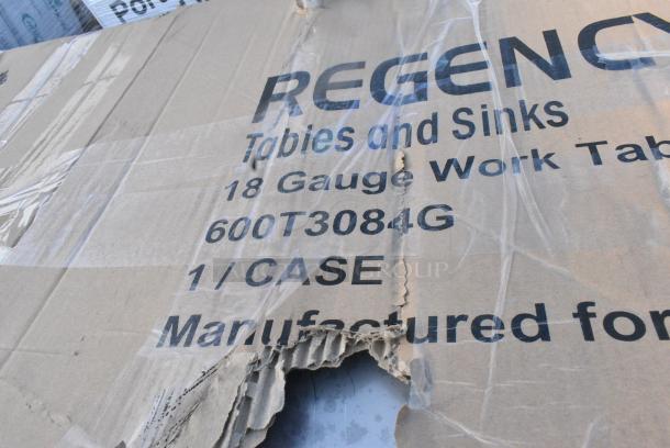 BRAND NEW SCRATCH AND DENT! Regency 600T3084G 30" x 84" 18-Gauge 304 Stainless Steel Commercial Work Table with Galvanized Legs and Undershelf. May Be Missing Pieces - Image 3 of 3