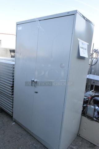 Tennsco Tan Metal 2 Door Cabinet.