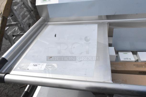 BRAND NEW SCRATCH AND DENT! Regency 600S32424224 124" 16-Gauge Stainless Steel Three Compartment Commercial Sink with 2 Drainboards - 24" x 24" - Image 7 of 11