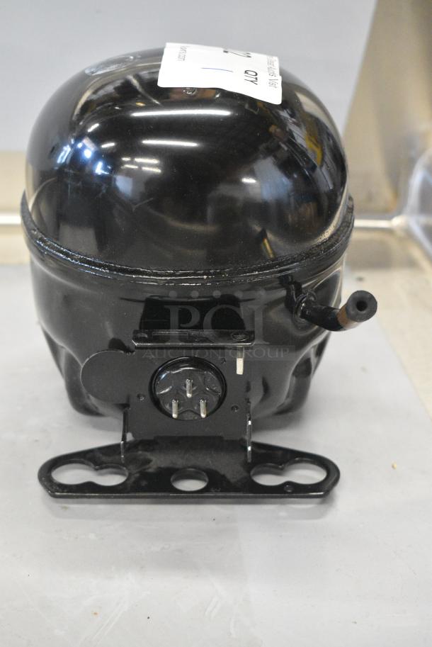BRAND NEW SCRATCH AND DENT! Embraco EMC3134U Compressor. 115-127 Volts, 1 Phase. - Image 4 of 5