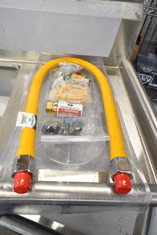 BRAND NEW SCRATCH AND DENT! 600GKM3448 Regency 48" Mobile Gas Connector Hose Kit with 2 Elbows, Full Port Valve, Restraining Device, and Quick Disconnect - 3/4" - Image 1 of 3
