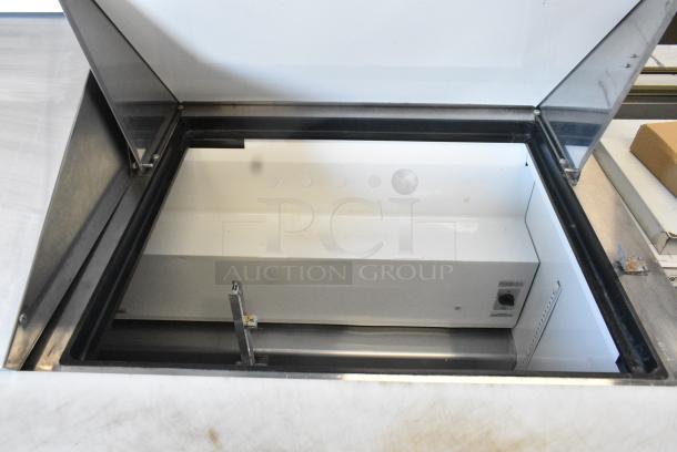 True TSSU-72-30M-B-ST Stainless Steel Commercial Sandwich Salad Prep Table Bain Marie Mega Top on Commercial Casters. 115 Volts, 1 Phase. Tested and Powers On But Does Not Get Cold - Image 6 of 10