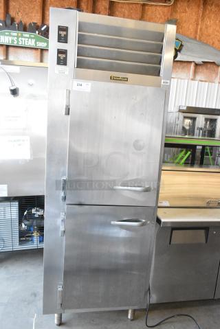 Traulsen RDT132WUT-HHS Stainless Steel Commercial 2 Half Size Door Reach In Cooler and Freezer. One Door Is Locked. 115 Volts, 1 Phase. - Item #1172668