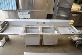 BRAND NEW SCRATCH AND DENT! Regency 600S21818224 124" 16-Gauge Stainless Steel Three Compartment Commercial Sink with 2 Drainboards - 24" x 24" x 14" Bowls. No Legs.