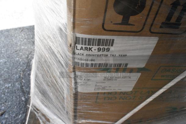 12 BRAND NEW SCRATCH AND DENT! Items Including Curtron MCS-36-AL Microshield 36" Aluminum Air Barrier - 120V, 427UMCBR09MC Lancaster Table & Seating 9' Round Mocha Umbrella Canopy for Bamboo Pulley Lift Umbrellas, 81A506336C , 81A506336C	1	Oasis 506336C POU1ACTHSK Aquarius Black Countertop Tri-Temp Point of Use Water Coole. 12 Times Your Bid! - Image 10 of 11