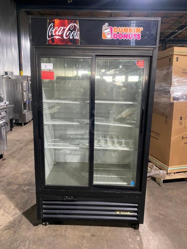 True Dunkin Donuts/Coca-Cola Style Commercial Black Double Glass Sliding Door Reach In Merchandiser Refrigerator! Energy Star Certified! With Poly Coated Wire Racks! Model: GDM-37EM-LD SN: 7510717! 115V 1 Phase! On Casters! - Image 1 of 9