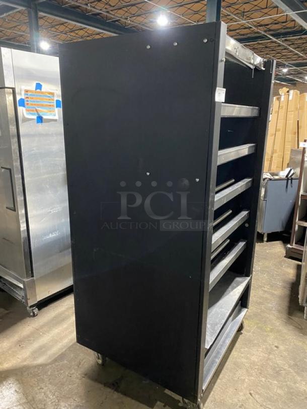 Vulcan Commercial Black Powder Coated Dry Open Lighted 5-Tier Donut/Bagel Bakery Merchandiser Display Showcase! With Stainless Steel Interior! With Enclosed Storage Underneath! Model: 1013776! 120V! On Casters! - Image 2 of 9