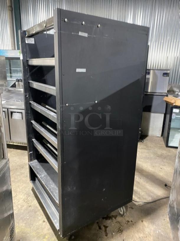 Vulcan Commercial Black Powder Coated Dry Open Lighted 5-Tier Donut/Bagel Bakery Merchandiser Display Showcase! With Stainless Steel Interior! With Enclosed Storage Underneath! Model: 1013776! 120V! On Casters! - Image 4 of 9