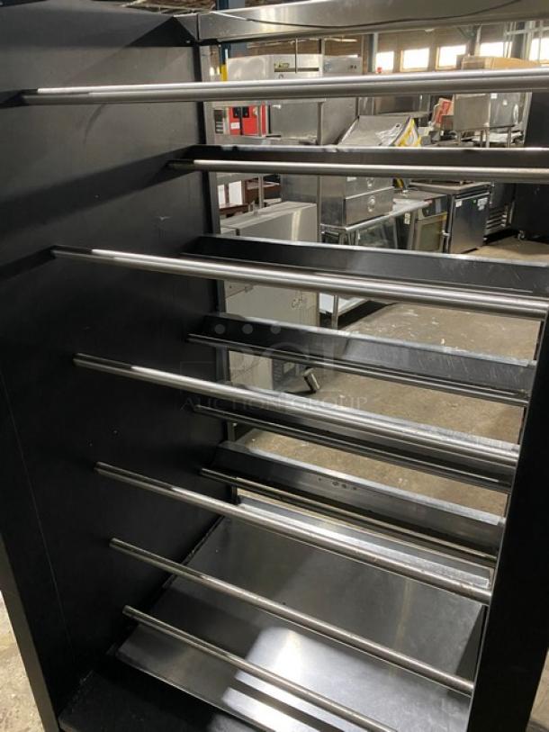 Vulcan Commercial Black Powder Coated Dry Open Lighted 5-Tier Donut/Bagel Bakery Merchandiser Display Showcase! With Stainless Steel Interior! With Enclosed Storage Underneath! Model: 1013776! 120V! On Casters! - Image 8 of 9