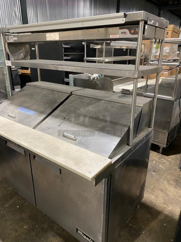 Migali Competitor Series Commercial Stainless Steel 2 Door Refrigerated Bain Marie Style Mega Top Salad/Sandwich Prep Table! With Double Overhead Shelves & Tag/Order Holder! With APW Wyott Model: FD-60H SN: 8002419020011 Electric Powered Overhead Heat Lamp/Food Warmer! With Poly Coated Wire Racks! Model: C-SP60-24BT-HC SN: C-SP60-24BT-HC00317122400920014! 115V 1 Phase! On Legs! - Image 2 of 12