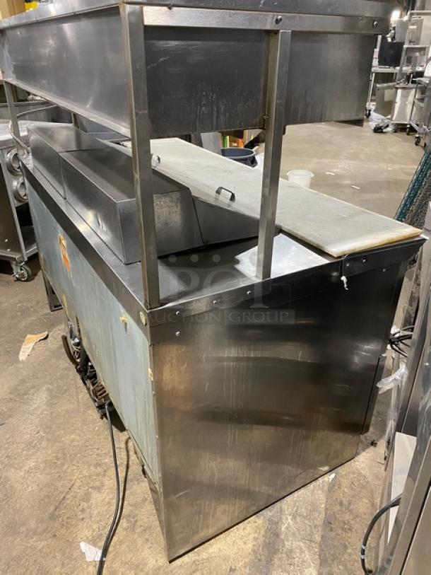 Delfield Commercial Stainless Steel 4 Drawer Refrigerated Bain Marie Style Mega Top Salad/Sandwich Prep Table! With Enclosed Storage Overhead! With Removable Cutting Board! Model: UCD4464N-12-DD5 SN: 1310152001294! 115V 1 Phase! On Casters! - Image 4 of 11