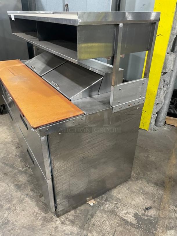 Delfield Commercial Stainless Steel 4 Drawer Refrigerated Bain Marie Style Mega Top Salad/Sandwich Prep Table! With Enclosed Overhead Storage! With Wooden Chopping Block Style Workstation! Model: UCD4464N-12-DD5 SN: 1303152000466! 115V 1Phase! - Image 3 of 10