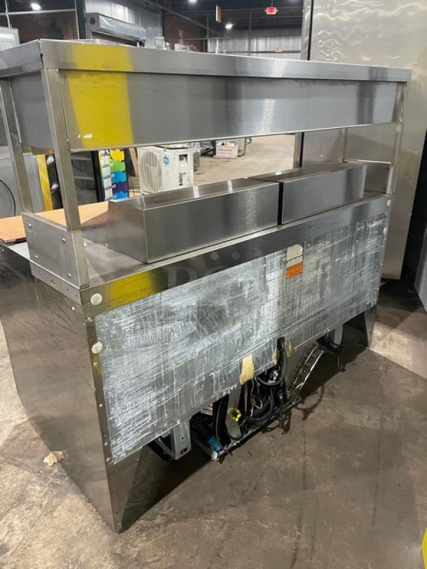 Delfield Commercial Stainless Steel 4 Drawer Refrigerated Bain Marie Style Mega Top Salad/Sandwich Prep Table! With Enclosed Overhead Storage! With Wooden Chopping Block Style Workstation! Model: UCD4464N-12-DD5 SN: 1303152000466! 115V 1Phase! - Image 4 of 10