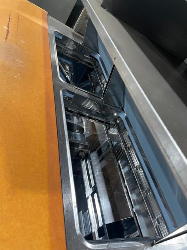 Delfield Commercial Stainless Steel 4 Drawer Refrigerated Bain Marie Style Mega Top Salad/Sandwich Prep Table! With Enclosed Overhead Storage! With Wooden Chopping Block Style Workstation! Model: UCD4464N-12-DD5 SN: 1303152000466! 115V 1Phase! - Image 7 of 10