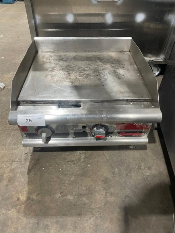 APW Wyott Champion Cook Series Commercial Stainless Steel Natural Gas Powered Countertop 24" Flat Griddle! With Snap-Action Thermostatic Controls & 1" Thick Smooth Polished Steel Griddle Plate! With Back & Side Splash! On Legs! - Image 1 of 7