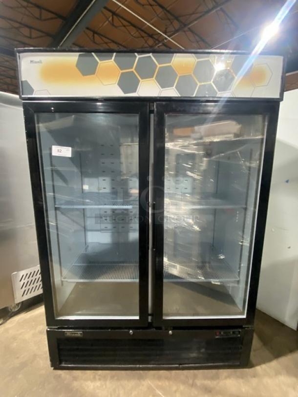 Migali Commercial Black Double Glass Swing Door Reach In Merchandiser Freezer! With Poly Coated Wire Racks! Model: C-49FM-HC SN: C-49FM-HC00318110900920002! 115V 1 Phase! - Image 1 of 7