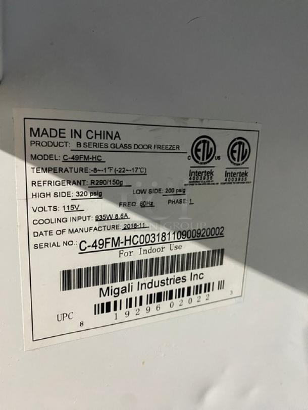 Migali Commercial Black Double Glass Swing Door Reach In Merchandiser Freezer! With Poly Coated Wire Racks! Model: C-49FM-HC SN: C-49FM-HC00318110900920002! 115V 1 Phase! - Image 6 of 7