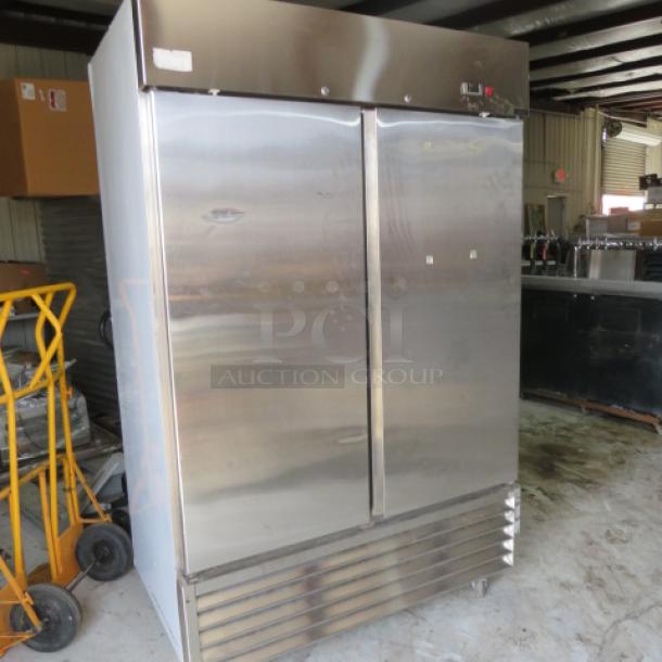 One WORKING SLIS 2 Door Stainless Steel Freezer With 8 Racks On Casters. Model# SUF49A2. 115 Volt. 53.5X32.5X84 - Image 1 of 5