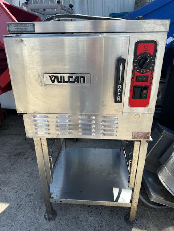 One Vulcan Electric Convection Steamer With Manuals On A SS Stand. Model# C24EA3. 208-240 Volt. 3/1 Phase. Working When Removed.  24X30X48. $10,225.00 - Image 1 of 2