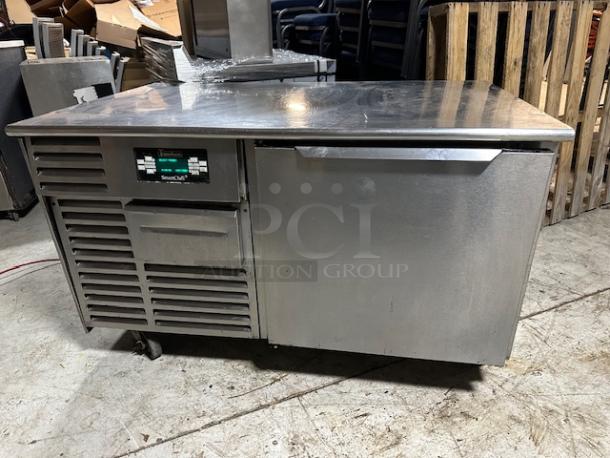 One WORKING Traulsen 50lb Smart Chill Blast Freezer With 3 Racks,  On Casters. No Probes.  Model# RBC50-ZWM12. 115 Volt. 54X34X33. $12013.25. - Image 1 of 1