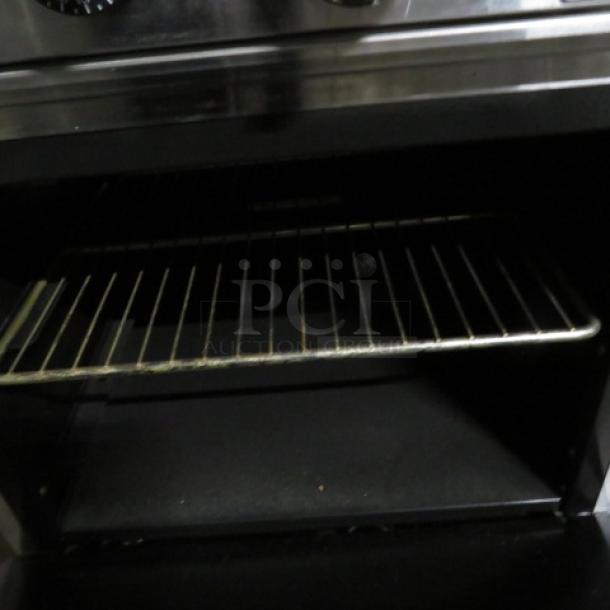 One Atosa Cook Rite Natural Gas Griddle Range With A SS Over Shelf, And 1 Rack On Casters.  Model# ATO-24G. 24X32X57. $1878.00 - Image 3 of 4