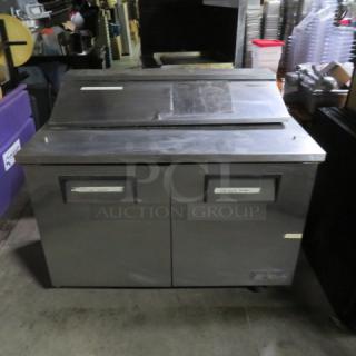 One True 2 Door Refrigerated Prep Table With 2 Racks On Casters. WORKING NOT COLD. Model# TSSU-48-12. 115 Volt. 48X30X43. $3978.00