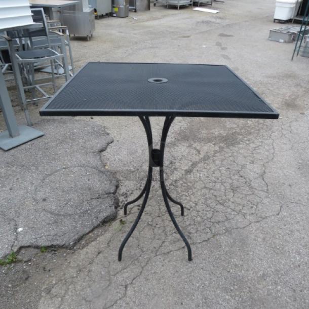 One Black Metal Bar Height Patio Table With An Umbrella Hole. 36X36X42. - Image 1 of 1