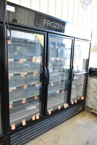 2018 True GDM-72F-HC Metal Commercial 3 Door Reach In Freezer Merchandiser w/ Poly Coated Racks. 115/208-230 Volts, 1 Phase. Tested and Working!