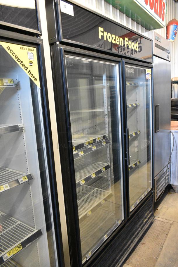 True GDM-49F-LD Metal Commercial 2 Door Reach In Freezer Merchandiser w/ Poly Coated Racks. 115/208-230 Volts, 1 Phase. Tested and Working! - Image 1 of 7