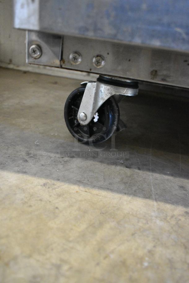 Turbo Air M3F24-1-N Stainless Steel Commercial Single Door Reach In Freezer w/ Poly Coated Racks on Commercial Casters. 115 Volts, 1 Phase. Tested and Working! - Image 3 of 6