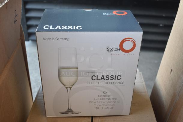 BRAND NEW SCRATCH AND DENT! Box of 24 Stolzle Classic Flute Champagne Glasses. - Image 1 of 5